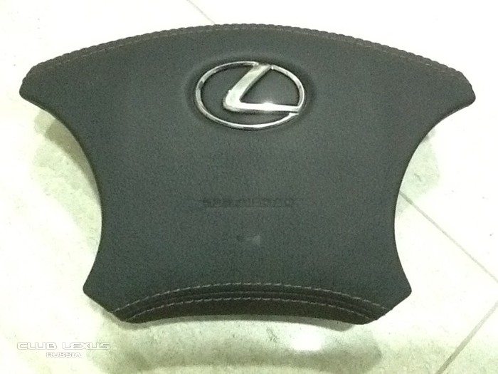 Замена эмблемы Lexus на накладке руля Замена эмблемы Lexus на накладке руля